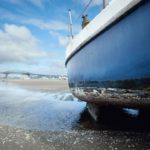 Boat at Little Shoal Bay Waiting for a High Tide and Summer Wind