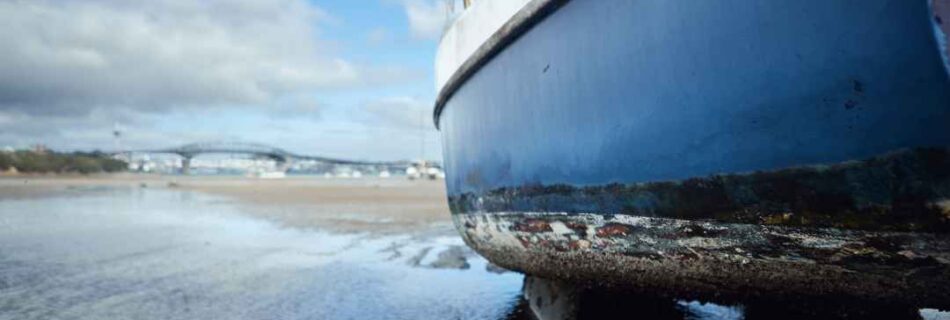 Boat at Little Shoal Bay Waiting for a High Tide and Summer Wind