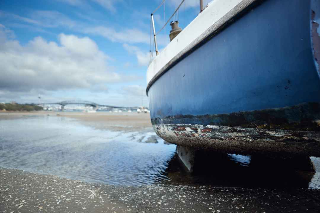 Boat at Little Shoal Bay Waiting for a High Tide and Summer Wind