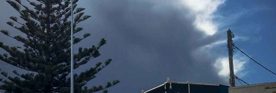 Turbulent skies over Birkenhead shops.